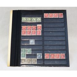 pile of stock sheets with canadian stamps