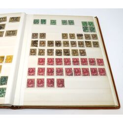 used brown stockbook including canadian stamps