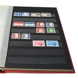 denmark collection in a red stockbook