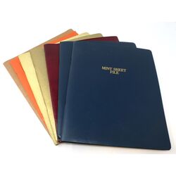 7 used sheet file albums